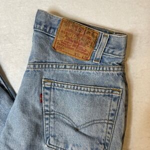 Vintage Levis 550 Relaxed Fit Jeans Mens 31x36 Light Wash Distressed Denim Pants